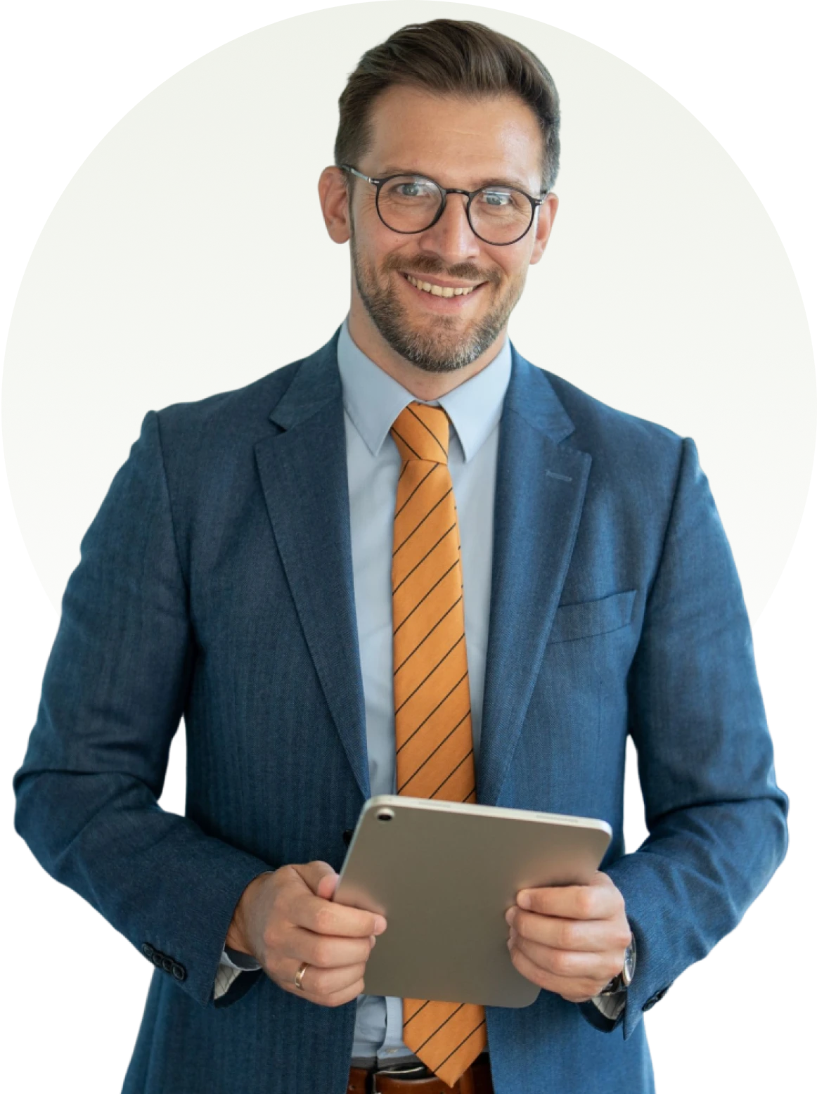 Smiling businessman holding a tablet